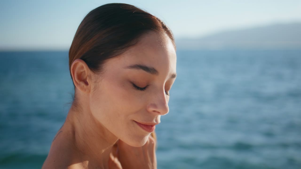 Woman receiving a non-invasive firming facial treatment at Miami Blue Spa